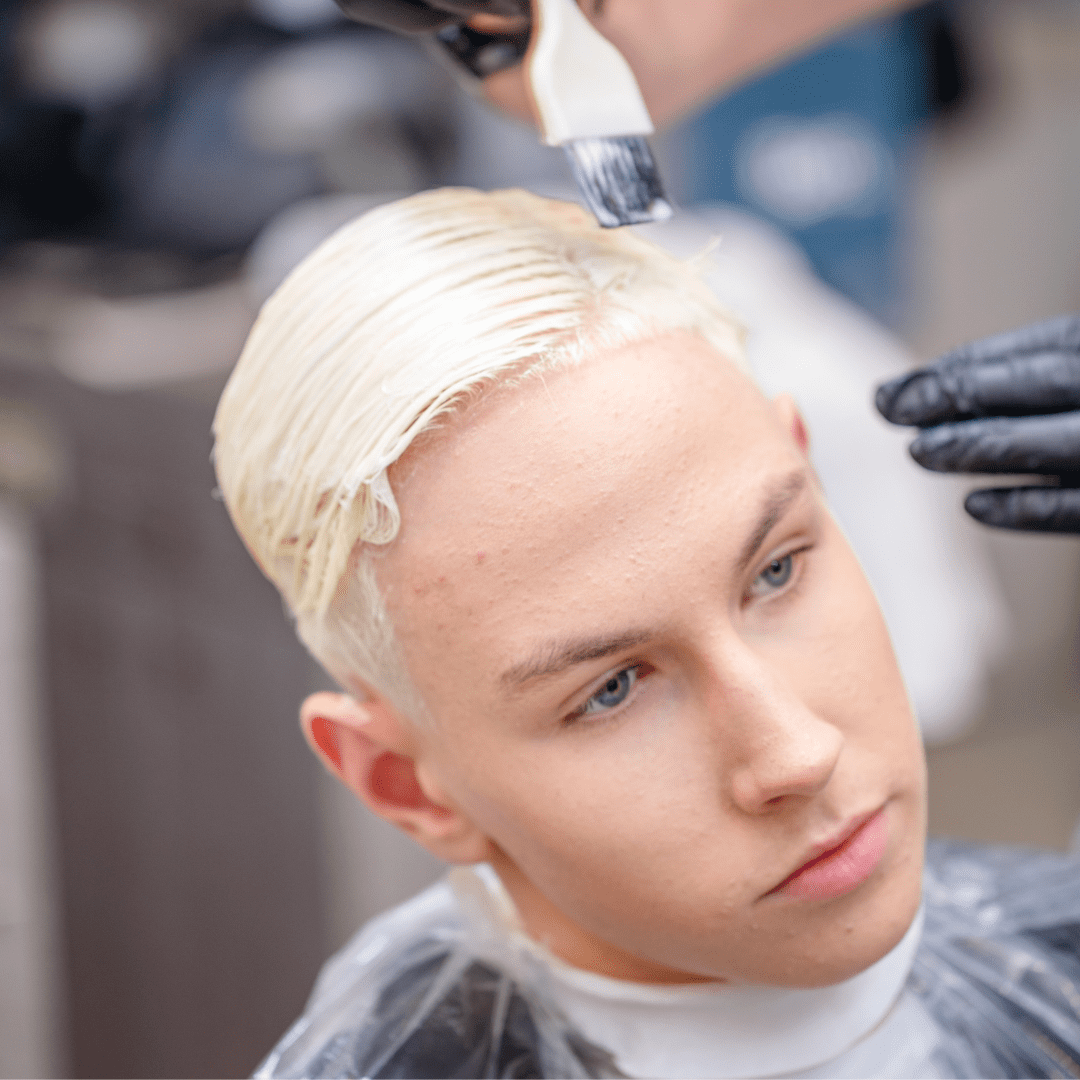 man getting hair dyed