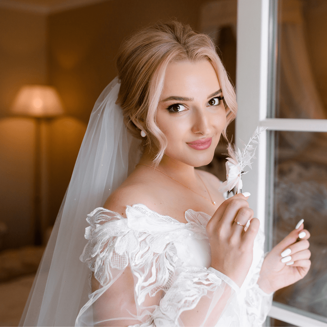 woman in wedding dress smiling